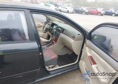 2004 Toyota Corolla Le z USA, uszkodzony, nr VIN JTDBR32E340052883